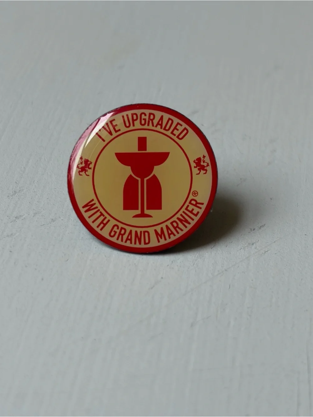 Vintage “I’ve Upgraded with Grand Marnier” Enamel Pinback Tac Hat Lapel Pin